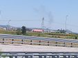 La colonna di fumo vista dall'autostrada Torino-Savona
