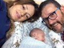 Mamma Marzia, il piccolo Noah e papà Roberto in uno scatto pubblicato sui social da quest'ultimo