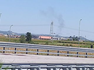 La colonna di fumo vista dall'autostrada Torino-Savona