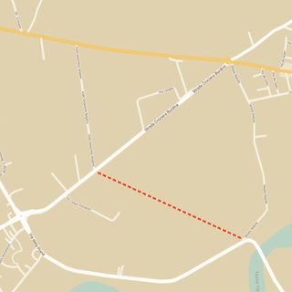 La linea tratteggiata individua per sommi capi il percorso della bretella destinata a collegare il ponte di Pollenzo con la Statale 231