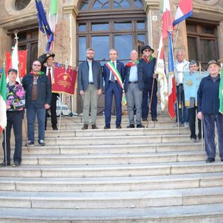 Alcuni scatti dalla cerimonia (foto Luciano Cravero) e due immagini del mercatino ripresi mediante drone da Tino Gerbaldo