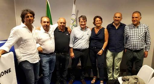 Pietro Blengini, al centro nella foto, alla sua prima designazione, nel 2018