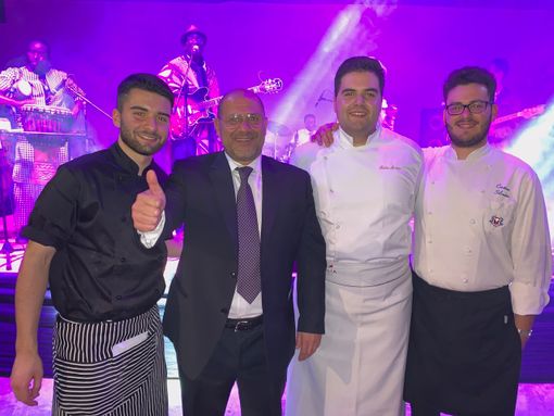 Mattia Martino, secondo da destra, insieme all'ambasciatore Arturo Luzzi e ai collaboratori Christian Silvestri e Giuseppe Bonifacino