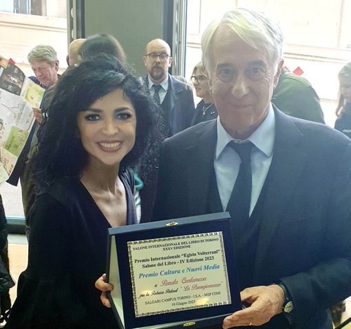 Renata Cantamessa premiata da Giuliano Pisapia