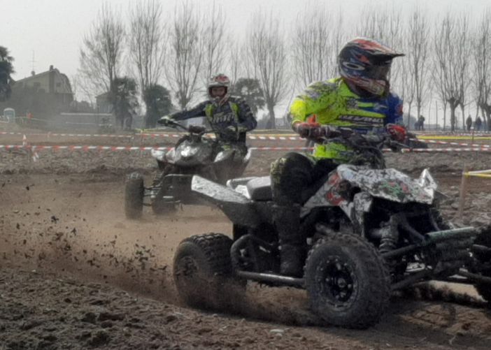 Primo piano di Daniel Dalmasso inseguito da un avversario Primo piano di Daniel Dalmasso inseguito da un avversario