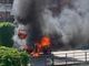 L'auto in fiamme nello scatto pubblicato da Elisa Motta sul gruppo Facebook "Sei di Alba se..."