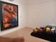 Un ambiente della mostra "Sintesi a colori" in Castiglia della Fondazione Garuzzo allestita per Start 2025