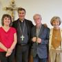 In foto il cardinale Repole a Bra con alcuni volontari del Santuario
