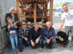 Graziella Pellegrino con alcuni parenti e amici dell'associazione &quot;Antichi Mestieri&quot; davanti al frantoio per la produzione dell'olio di oliva