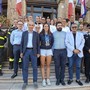 Anita Gastaldi insieme ai familiari e alle autorità al termine della premiazione Anita Gastaldi insieme ai familiari e alle autorità al termine della premiazione