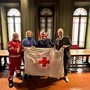 8 maggio Giornata Mondiale della Croce Rossa, ad Alba torri illuminate di rosso e bandiera esposta dal Palazzo Comunale