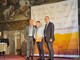 Alberto Biraghi con il figlio William ritirano il premio al festival dei formaggi piemontesi