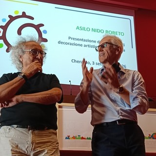 L'artista Coco Cano e Claudio Olivero, presidente di Banca di Cherasco