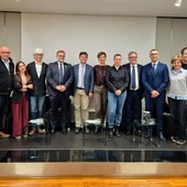 Alcuni momenti dell'incontro tenuto a Palazzo Banca d'Alba