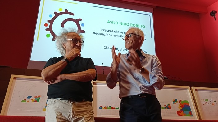 L'artista Coco Cano e Claudio Olivero, presidente di Banca di Cherasco L'artista Coco Cano e Claudio Olivero, presidente di Banca di Cherasco