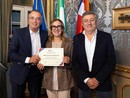 Lorena Salvatico e Alberto Vinai premiati dal vicepresidente Franco Graglia Lorena Salvatico e Alberto Vinai premiati dal vicepresidente Franco Graglia