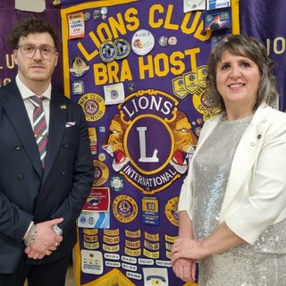 In foto Silvia Gullino con Andrea Molineris, soci del LC Bra Host