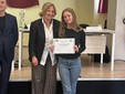 In foto alcuni momenti della premiazione svoltasi mercoledì 15 aprile e Luisa Burzio ritratta con l'attestato e le sue docenti di filosofia, profssa Laura Demichelis, e di latino e greco, profssa Elena Rolando