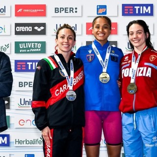 Al centro la 19enne Curtis oro nei Farfalla (foto da Fin.it Giorgio Scala / Deep Blue Media)
