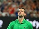 Djokovic si prende un warning e litiga con l'arbitro: "Stavo cercando il mio cappello" Djokovic si prende un warning e litiga con l'arbitro: "Stavo cercando il mio cappello"