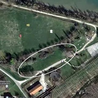 Nel cerchio bianco dove è stata posizionata la zona eventi del Parco Tanaro dove ora è presente il Circo di Collisioni